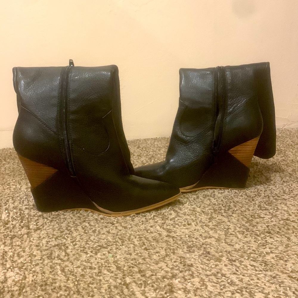Black leather high heel boots